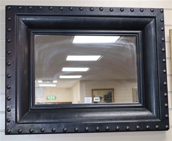 A rectangular grey painted wall mirror, 89 x 69cm.